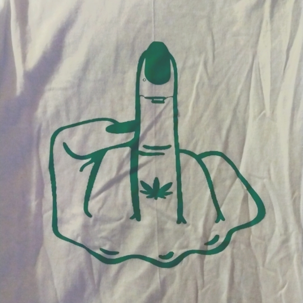 White T with gree 🖕🏾